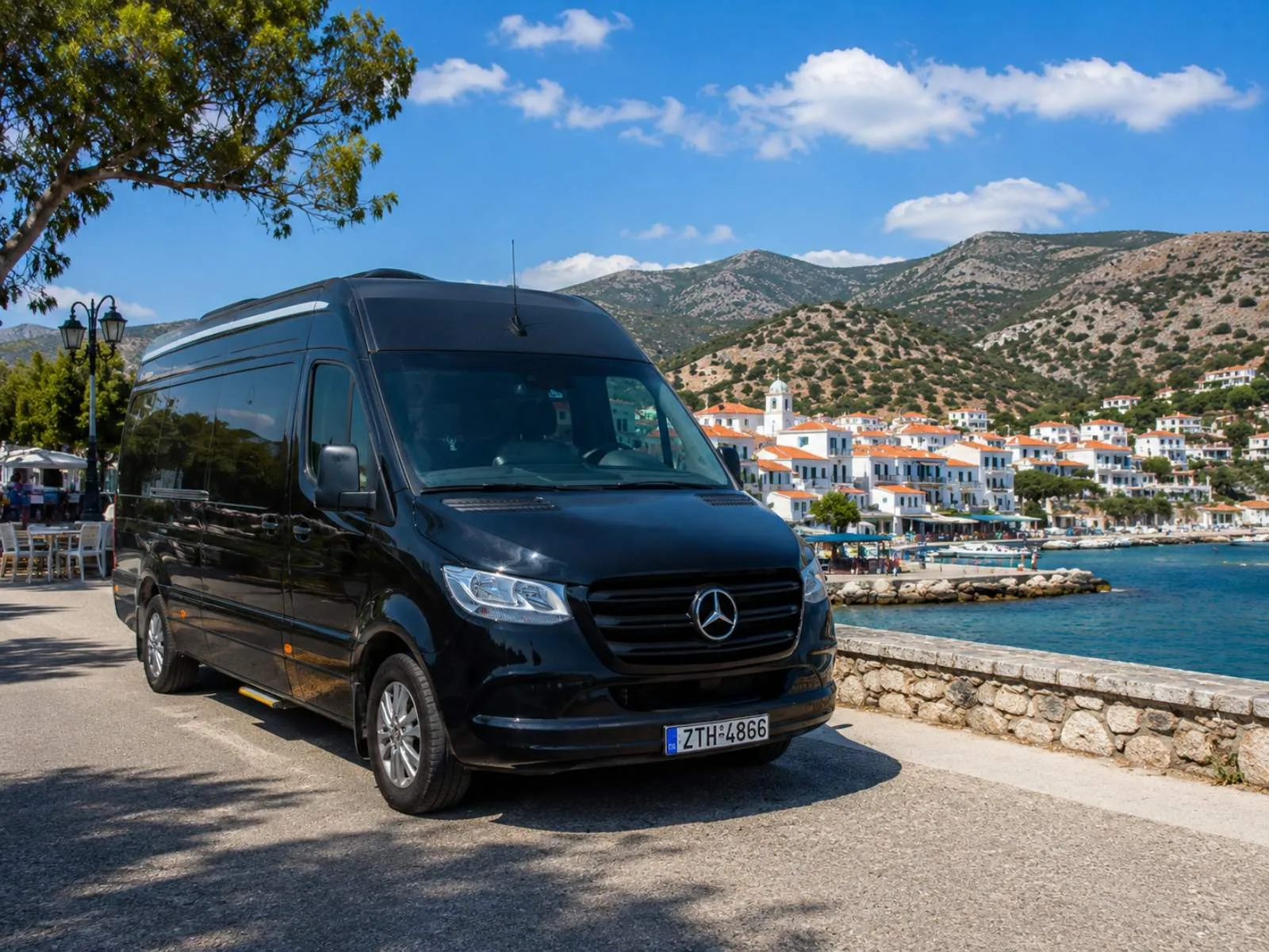 Mercedes Sprinter at a Greek seaside village — private day trips from Athens